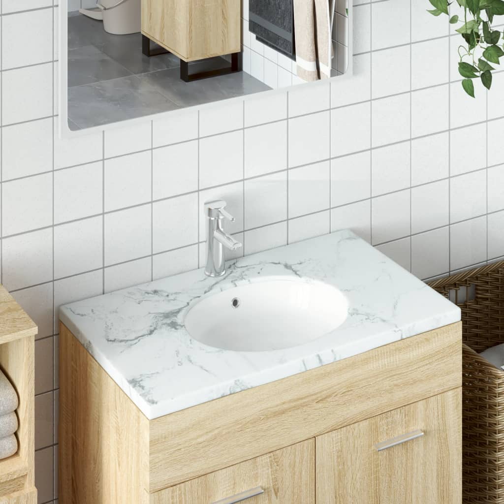 vidaXL Kúpeľňové umývadlo biele 38,5x33,5x19 cm oválne keramické