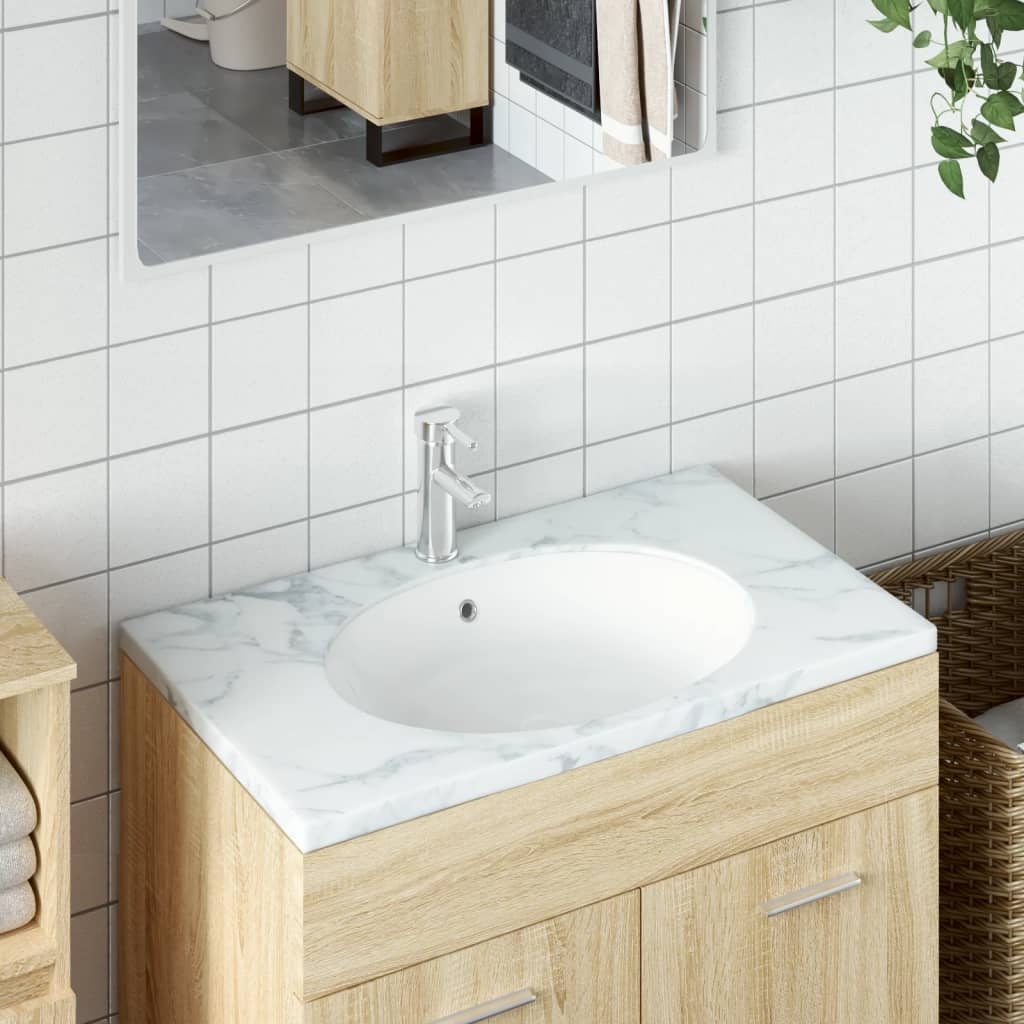 vidaXL Kúpeľňové umývadlo biele 47x39x21 cm oválne keramické
