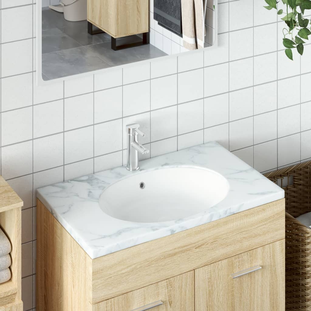 vidaXL Kúpeľňové umývadlo biele 56x41x20 cm oválne keramické
